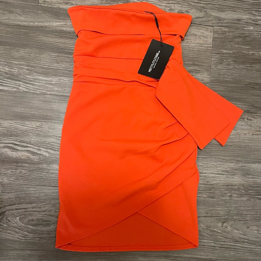 New Pretty Little Thing , Size 2 Dress. Bright orange short cocktail mini dress
